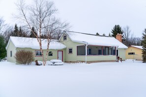 Exterior - Bass Bay Getaway | Lakefront Family Cottage (Elk Rapids)