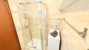 Dutxa, assecador de cabells i tovalloles 