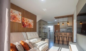 Basic Apartment | Living area | 32-inch Smart TV with digital channels - Apt in Condo w/ BBQ Area in Porto - BA MAA (Porto Seguro)