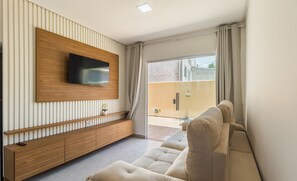 Basic Apartment | Living area | 32-inch Smart TV with digital channels