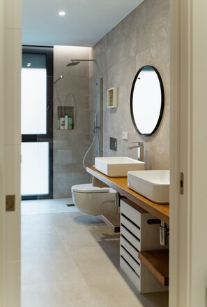 Shower, hair dryer, towels, soap