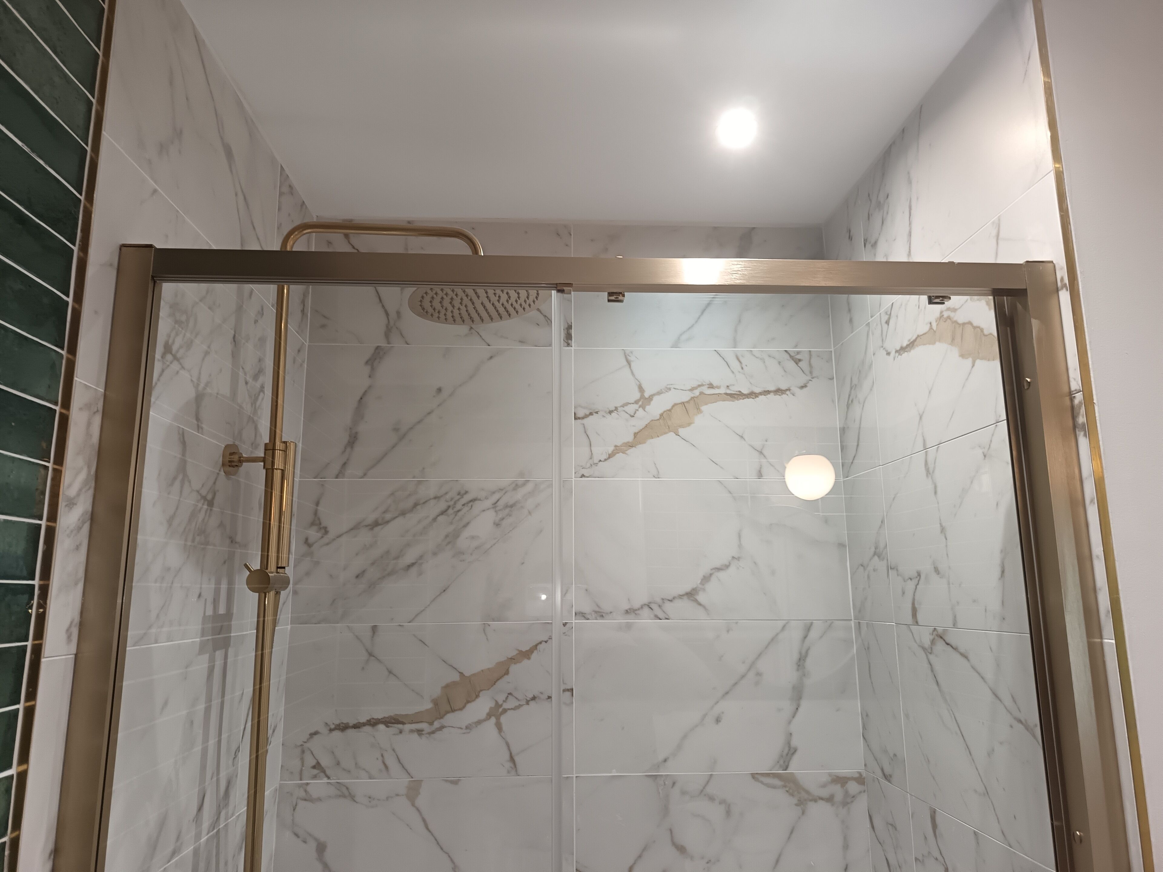 Shower, hair dryer, towels, toilet paper