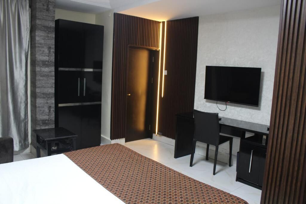 Desk, laptop workspace, blackout curtains, soundproofing