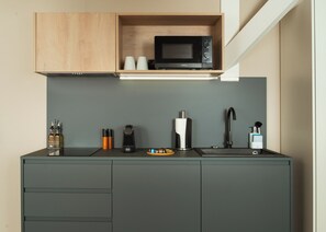 Suite with Sofa Bed | Private kitchen