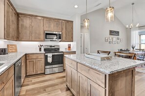 Fridge, microwave, oven, stovetop - Dual Homes Near Canyon Lake | 2 Hot Tubs, Firepits & Fenced Yards (Canyon Lake)