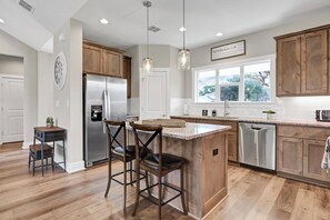 Fridge, microwave, oven, stovetop - Dual Homes Near Canyon Lake | 2 Hot Tubs, Firepits & Fenced Yards (Canyon Lake)