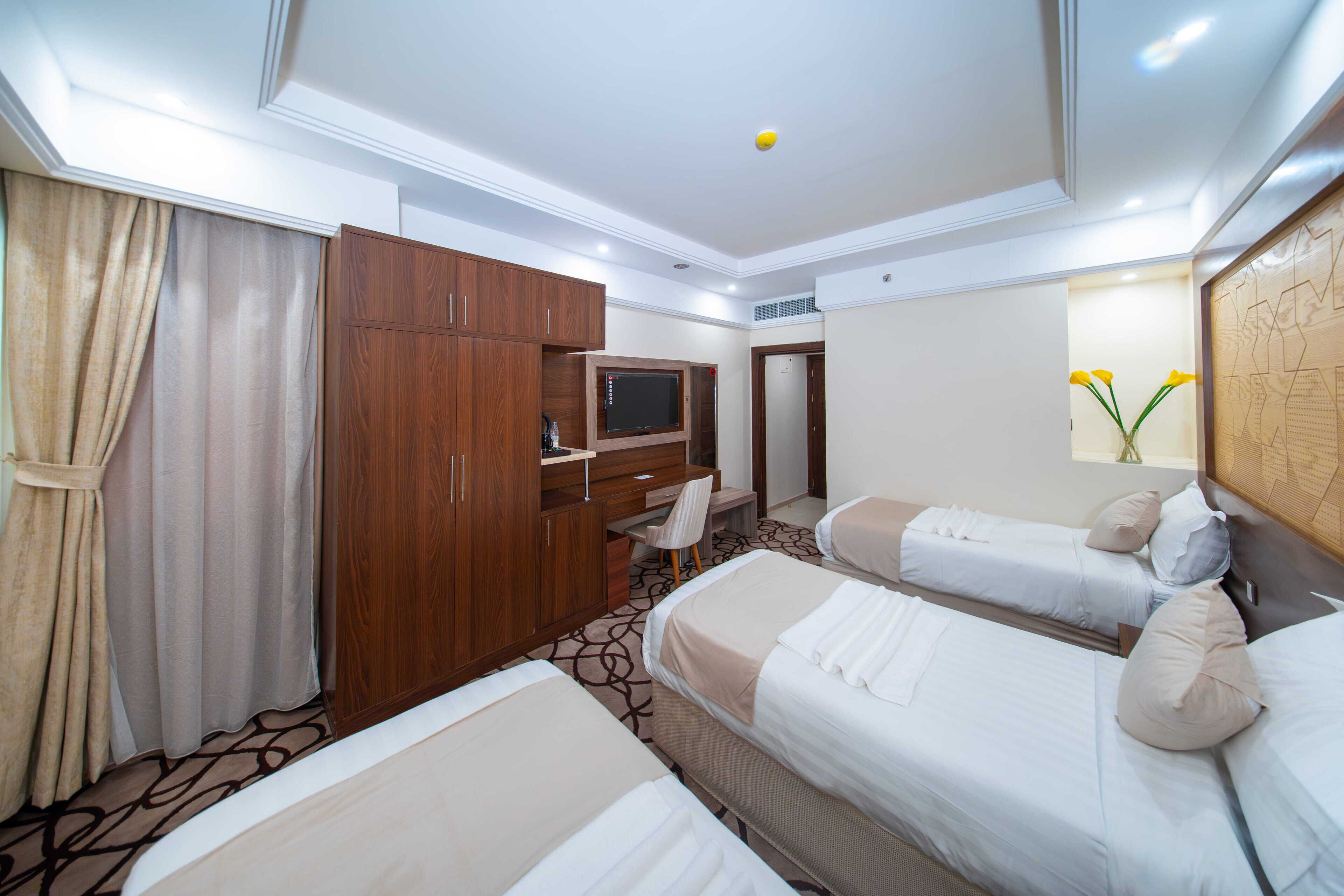 Camera tripla, bagno privato | Tende oscuranti, ferro/asse da stiro, Wi-Fi gratuito