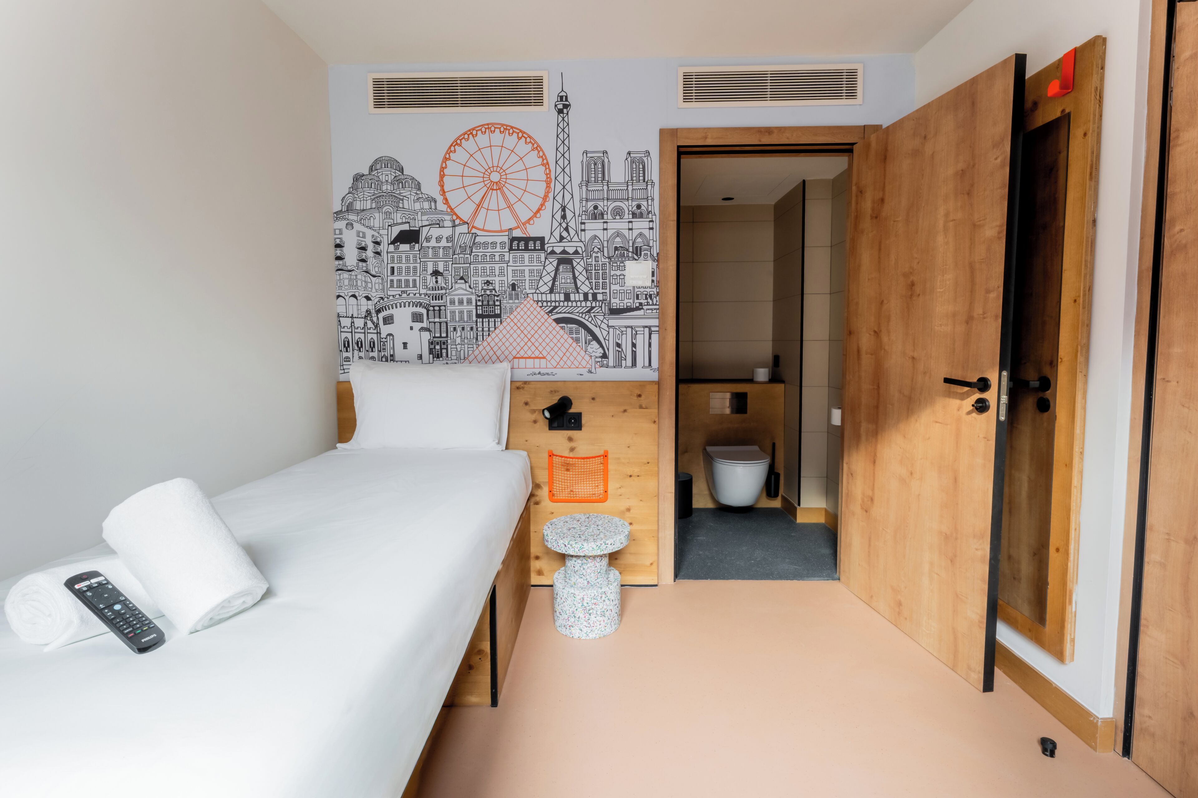 Memory-foam beds, desk, laptop workspace, soundproofing