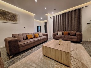 Economy Apartment, Balcony, City View | Living area - Vicbalkon Luxury Apartment (Abuja)