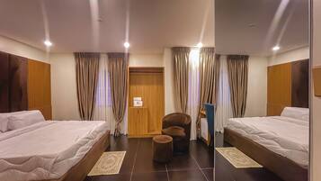 Executive Room, City View | Desk, laptop workspace, iron/ironing board, free WiFi