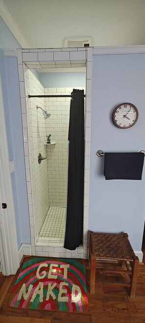 Shower, towels, soap, toilet paper