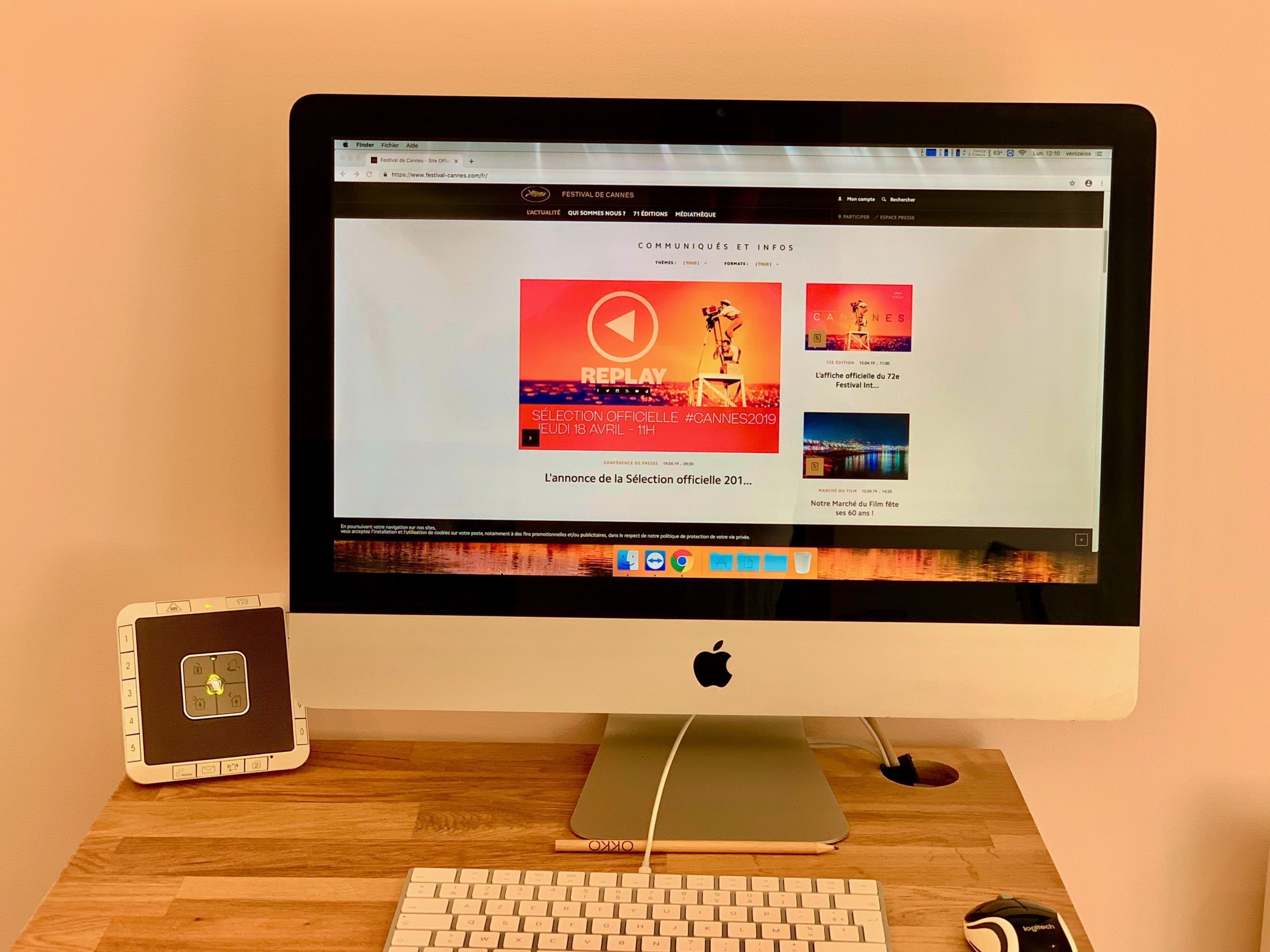 A desktop computer with a monitor displaying a website.