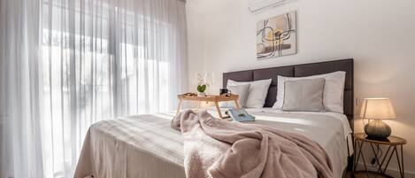 2 عدّة غرف نوم ومكواة/لوح كي وسرير سفر وواي فاي مجانًا