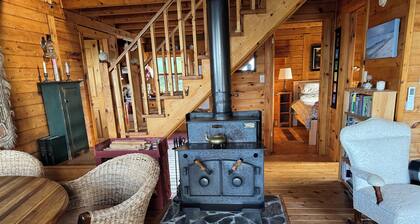 Log chalet on a high bluff overlooking the Atlantic Ocean