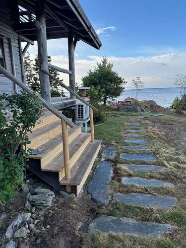 Log chalet on a high bluff overlooking the Atlantic Ocean