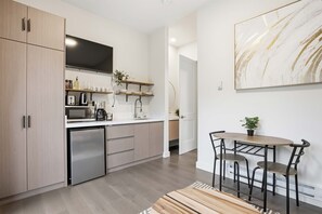 Microwave, coffee/tea maker, toaster, cookware/dishes/utensils