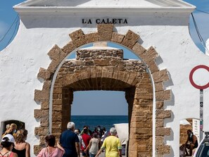 An archway labeled "LA CALETTA" leading to a beach. - El Balcon de la Vi a by Cadiz Time (Cádiz)