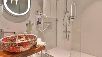 Hair dryer, towels, soap, toilet paper
