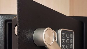 A black door with a numeric keypad lock. - The Master's Suite [In the heart of the Borgo] (Bienno)