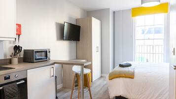 1 dormitorio, tabla de planchar con plancha, Internet y ropa de cama
