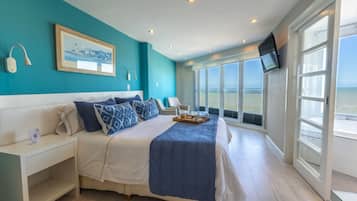 Suite, non-fumeurs, vue mer | Coffres-forts dans les chambres, bureau, Wi-Fi gratuit