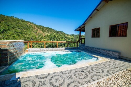 Villa Azul in Jarabacoa, a mountain refuge, next to the Yaque River.