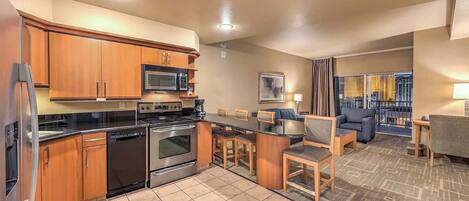 Fridge, microwave, stovetop, coffee/tea maker