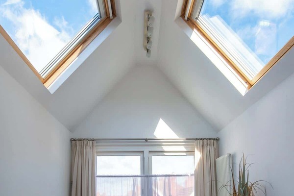 Relax in the bedroom at Blue Puffin Stays Short Lets & Serviced Accommodation, complete with high-quality bed, premium linens, and a cosy lampshade with great sky view—perfect for a restful night after a day of exploring