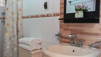 Hair dryer, towels, toilet paper