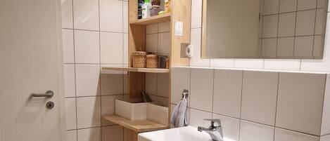 Shower, towels, toilet paper