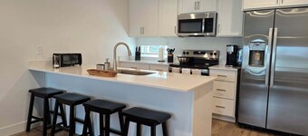 Salt City Executive Townhome a Modern Central Retreat with 2 En Suite Bathrooms