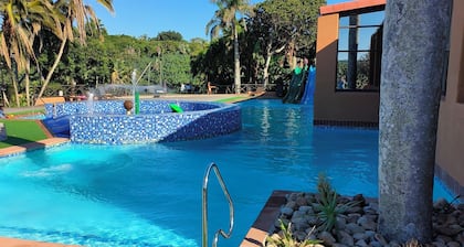 Large, spacious 2-bedroom, 2.5-bathroom villa, river views, golf ,tennis , beach