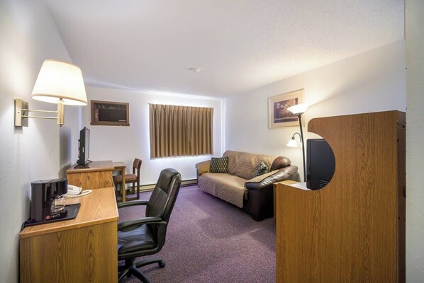 Deluxe Double Room, 2 Double Beds, Hill View | Living area | 42-inch LED TV with satellite channels - The Roosevelt Hotel & RV Park Gateway to Theodore Roosevelt National Park-Medora-on i-94 (Wibaux)
