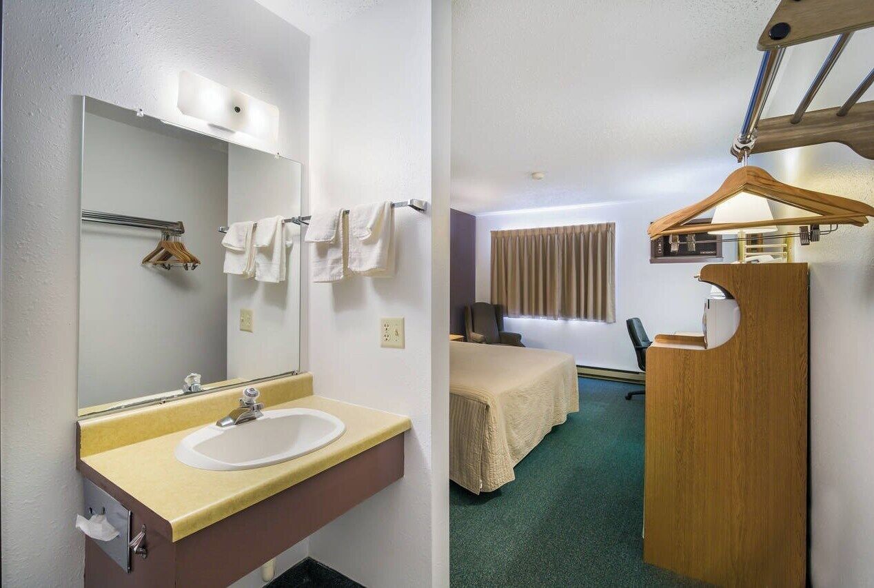 Desk, laptop workspace, blackout drapes, soundproofing