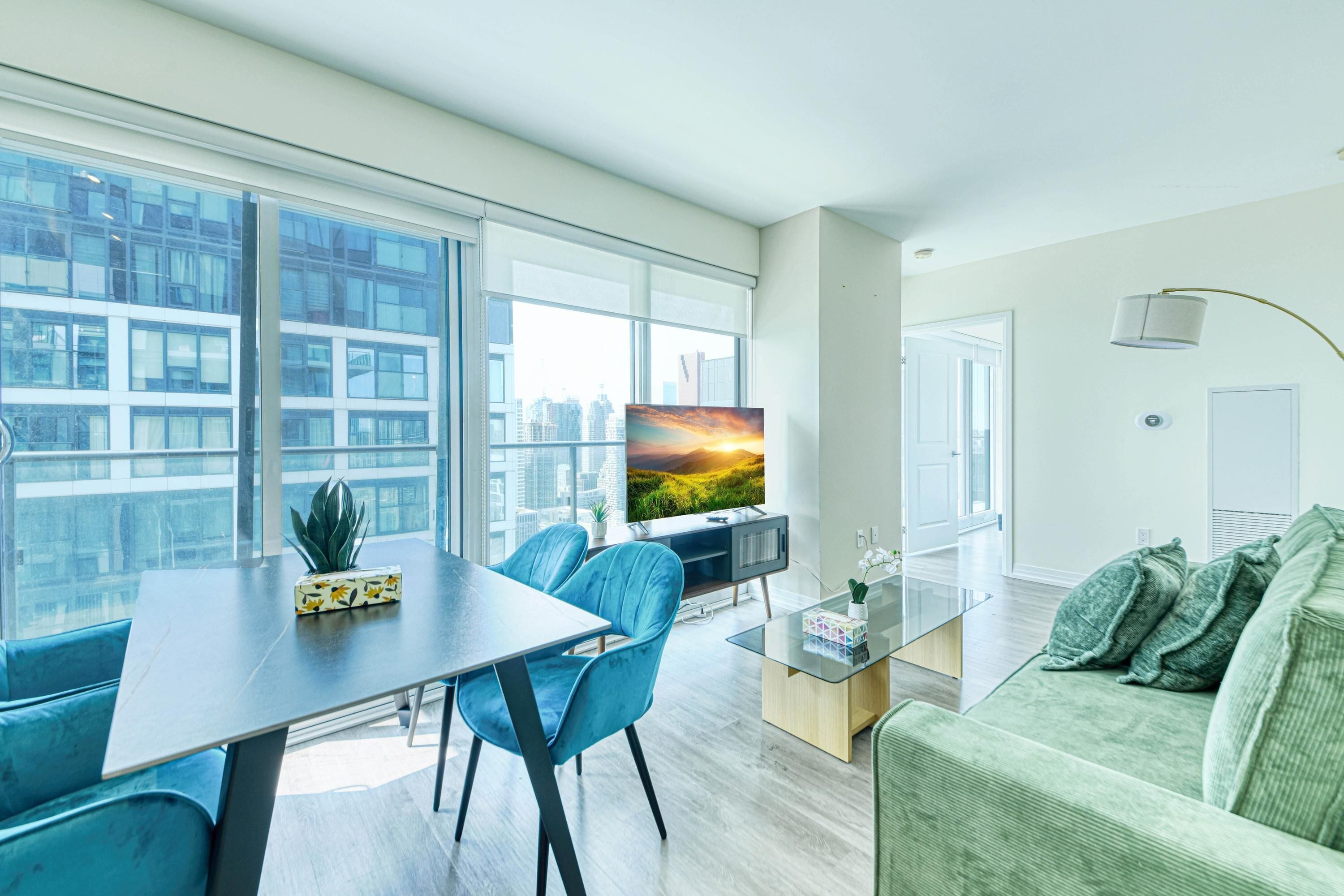 Panoramic Suite, 2 Bedrooms | Living area | 65-inch TV with digital channels