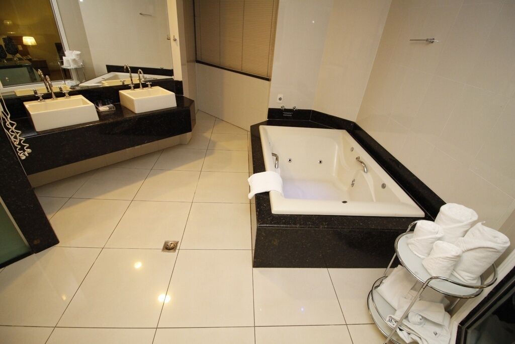 Superior Room | Bathroom | Shower, hair dryer, towels, soap