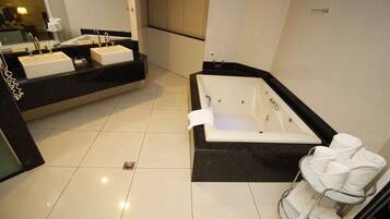 Superior Room | Bathroom | Shower, hair dryer, towels, soap