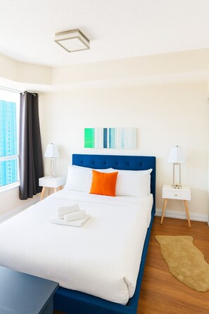 1 bedroom, desk, iron/ironing board, travel crib