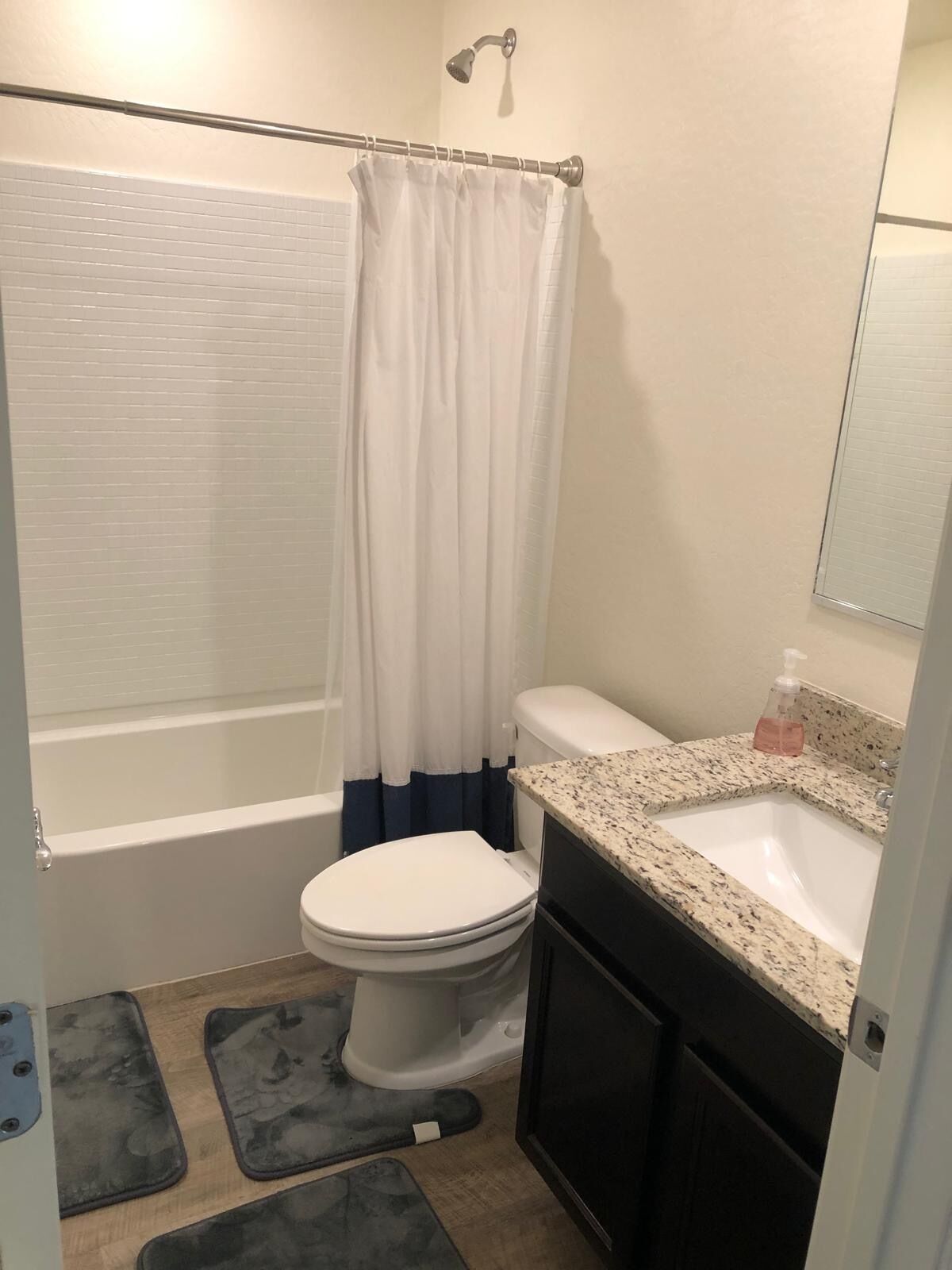 Shower, towels, soap, toilet paper