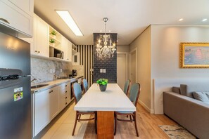 Romantic Apartment, 1 Queen Bed with Sofa bed, Garden View, Garden Area | Living area - Stay Home Luxo Gramado | 1min Rua Coberta | Ar Cond | Premium (Gramado)
