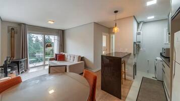 Departamento Confort, cocina, vista a la ciudad | Comedor