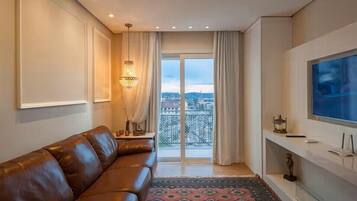 Appartement Ville, 1 grand lit et 1 canapé-lit, climatisation, vue ville | Coin séjour