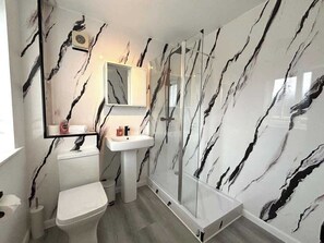 Shower, hair dryer, shampoo