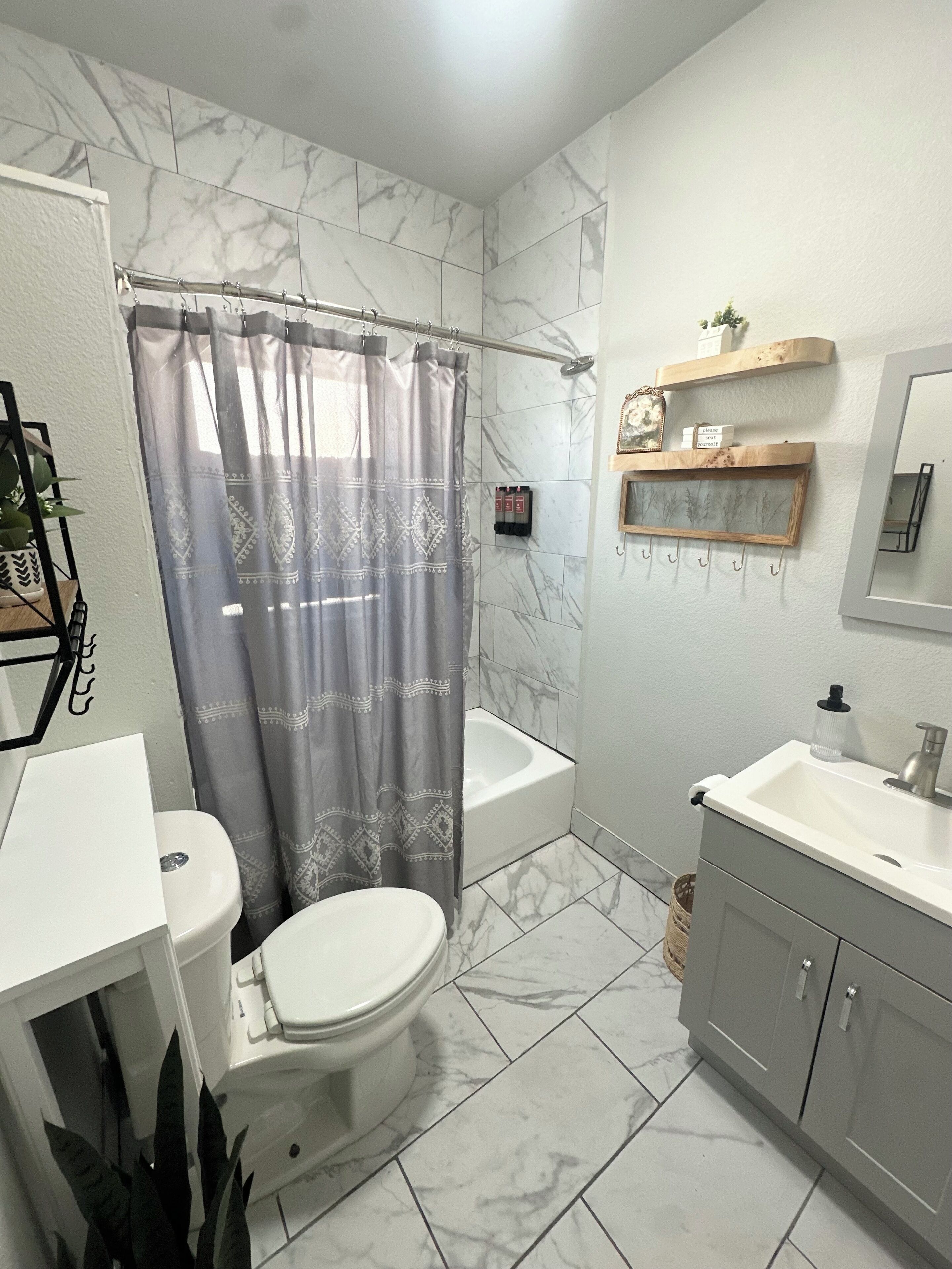 Hair dryer, towels, soap, toilet paper