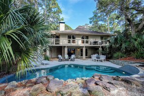 Outdoor pool, a heated pool - Wren's Nest - 4BR Sea Pines Retreat + Waterfall Pool + Walk to Beach (Hilton Head Island)