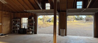 Escape to this “Country Manor” on almost 3 acres with incredible views.