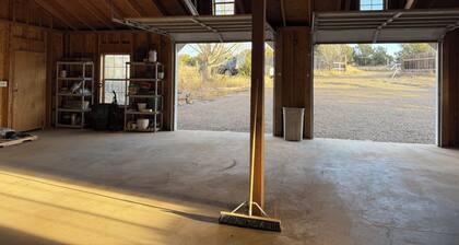 Escape to this “Country Manor” on almost 3 acres with incredible views.