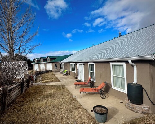 Escape to this “Country Manor” on almost 3 acres with incredible views.