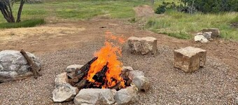 Escape to this “Country Manor” on almost 3 acres with incredible views.