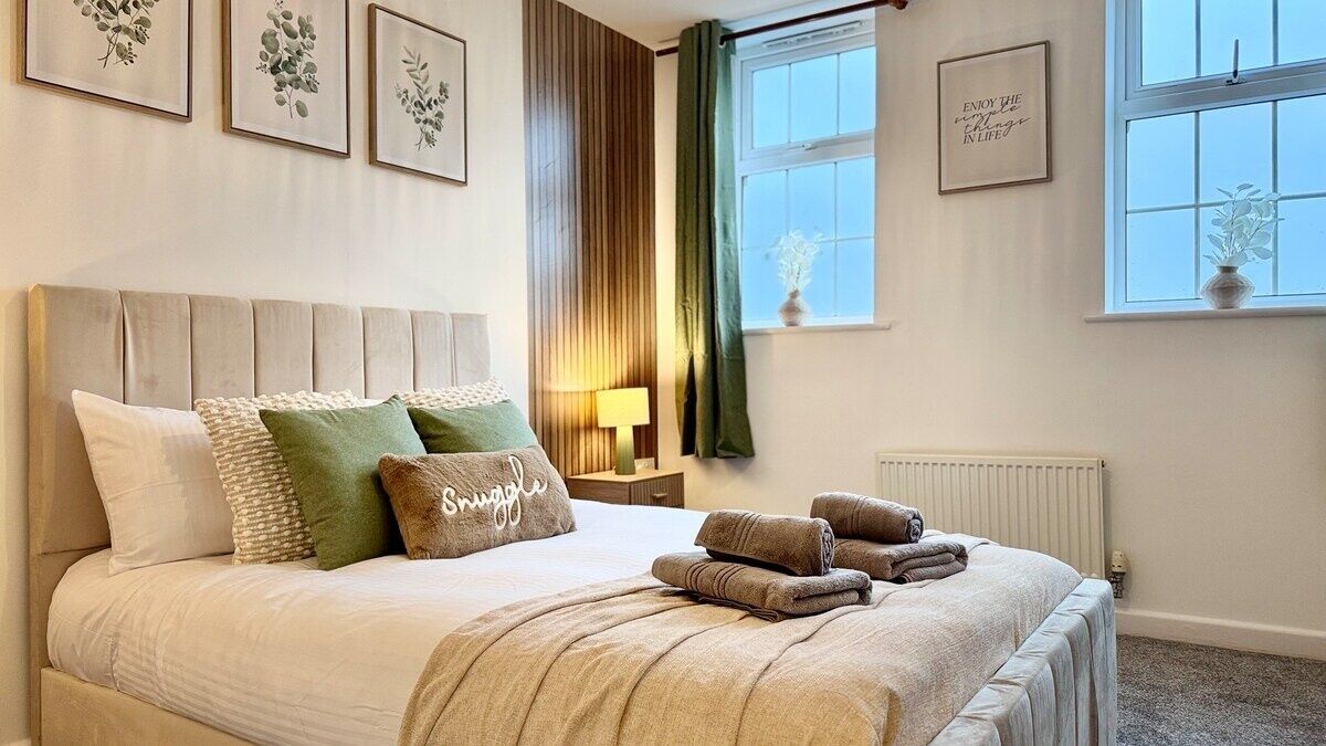 2 dormitorios, tabla de planchar con plancha, wifi gratis y ropa de cama